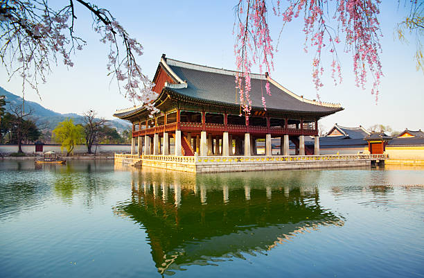 A majestic view of Gyeongbokgung Palace, the main royal palace of the Joseon Dynasty in Seoul. The image shows the iconic Geunjeongjeon Hall with its grand architecture, representing the center of Korean history and the most popular spot for the Palace Cultural Festival.
